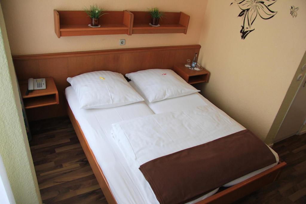 Hotel Columbia Berlim Quarto foto