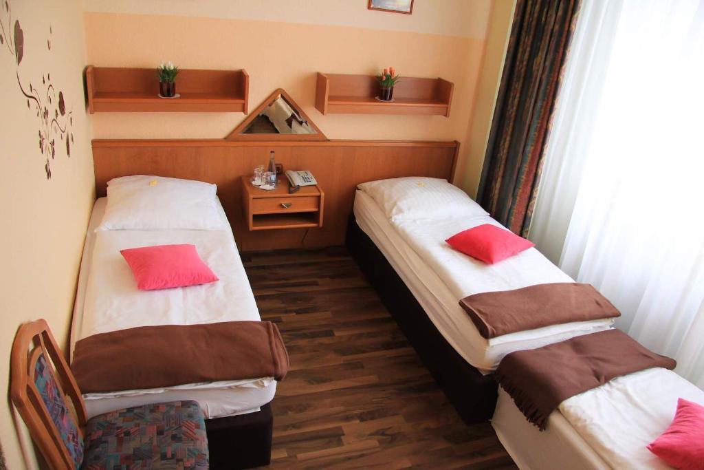 Hotel Columbia Berlim Quarto foto